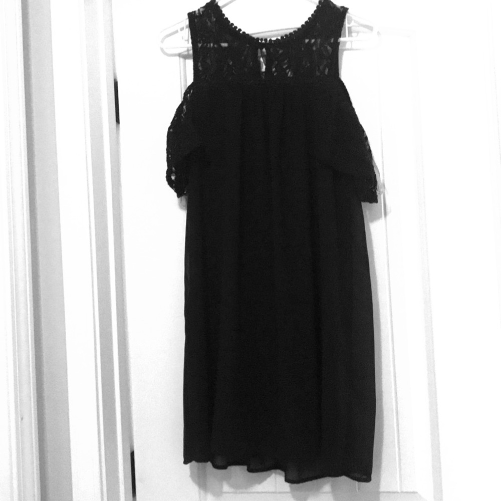 Mid-length black dress w/ lace neckline